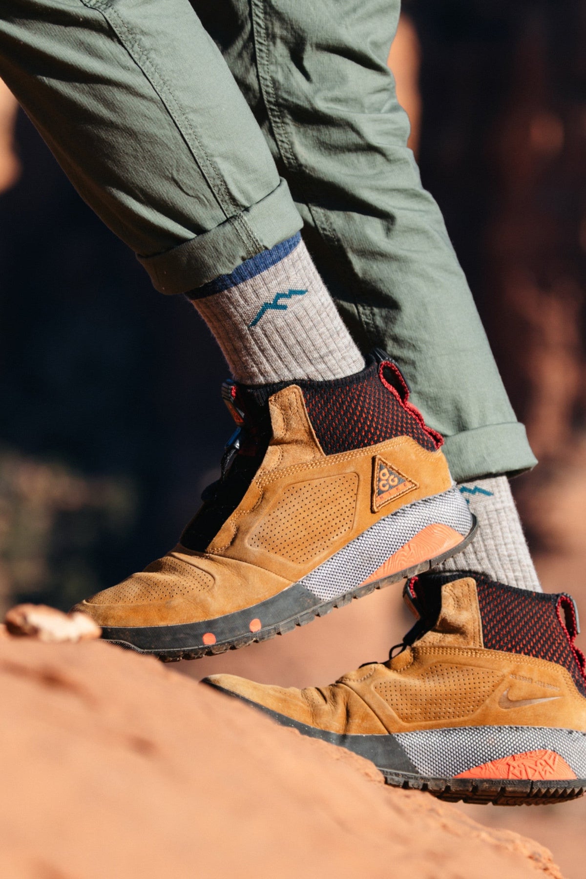 Darn Tough Men's Hiker Micro Crew Midweight Hiking Socks in Rye worn outdoors, Darn Tough's best-selling midweight cushioned merino hiking sock, built for long days on the trail, job sites, hunting and cold-weather wear, guaranteed for life