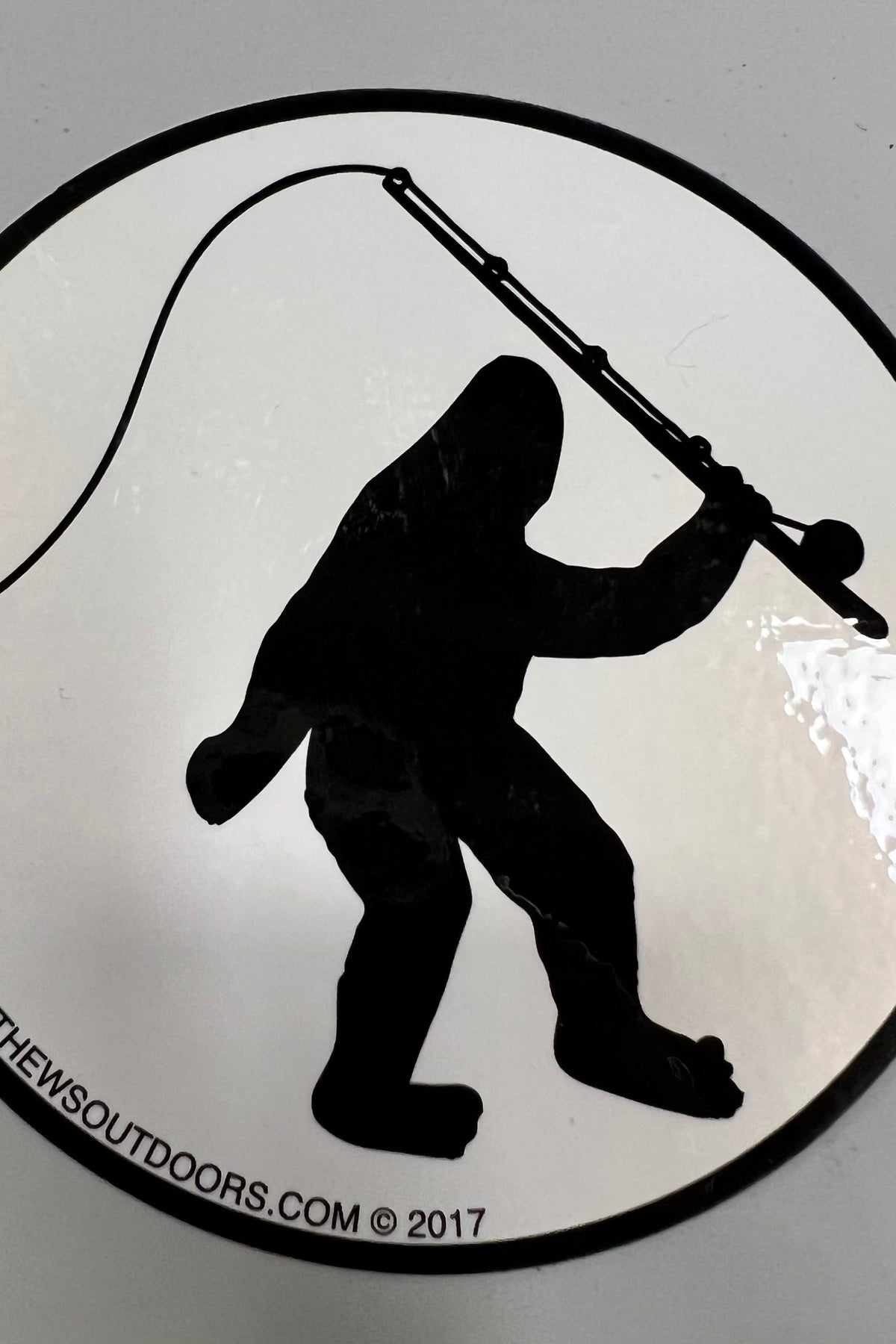 Bigfoot Mountain Outfitters Round Bigfoot Fly Fishing Sticker, a fun sticker for water bottles, laptops, coolers and truck windows