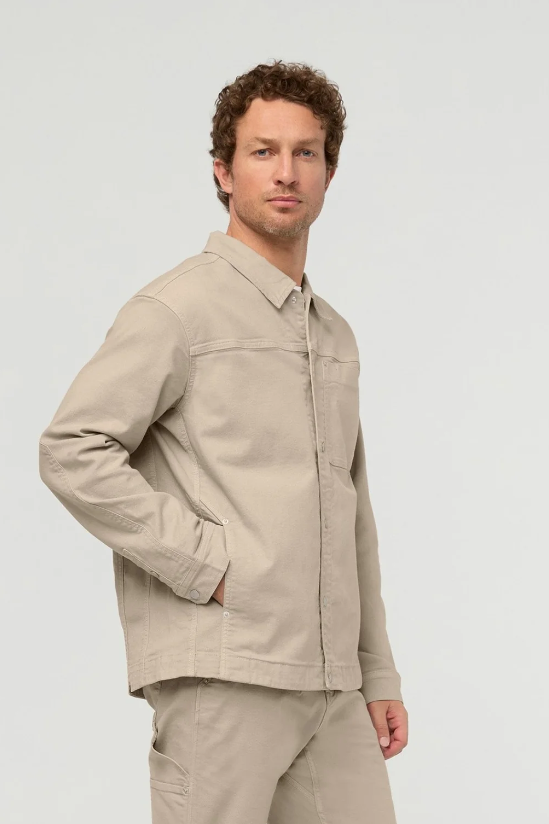 DUER Stretch Canvas Work Jacket in Garment Dye Sand, a rugged, good-looking layer for the office, outdoor adventures and chilly evenings