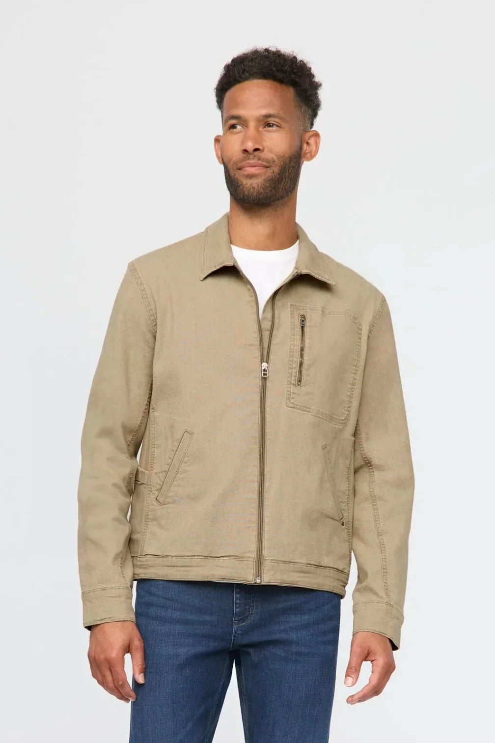 DUER stretch canvas work jacket in Garment Dye Sand, a rugged but flexible workwear jacket for job sites, yard work, fall weekends and everyday wear